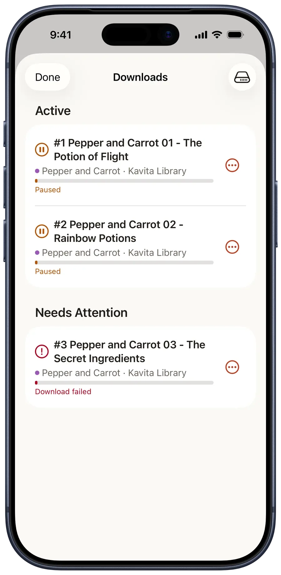Downloads with two paused Pepper and Carrot books under Active and one failed transfer under Needs Attention